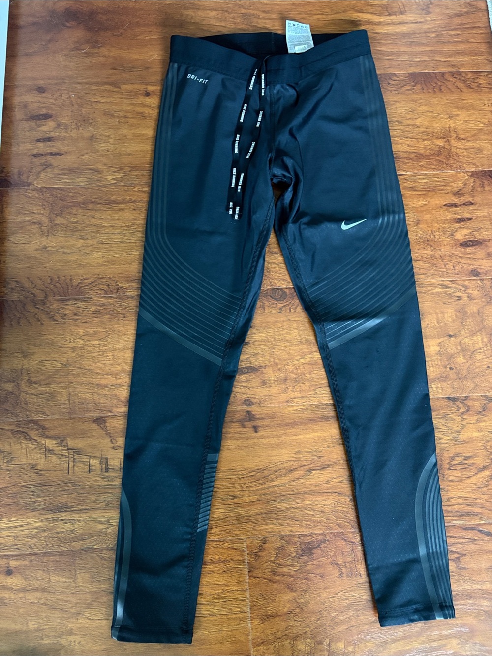 Nike Women’s Black Dri-FIT Athletic Leggings with Subtle Stripe Detail